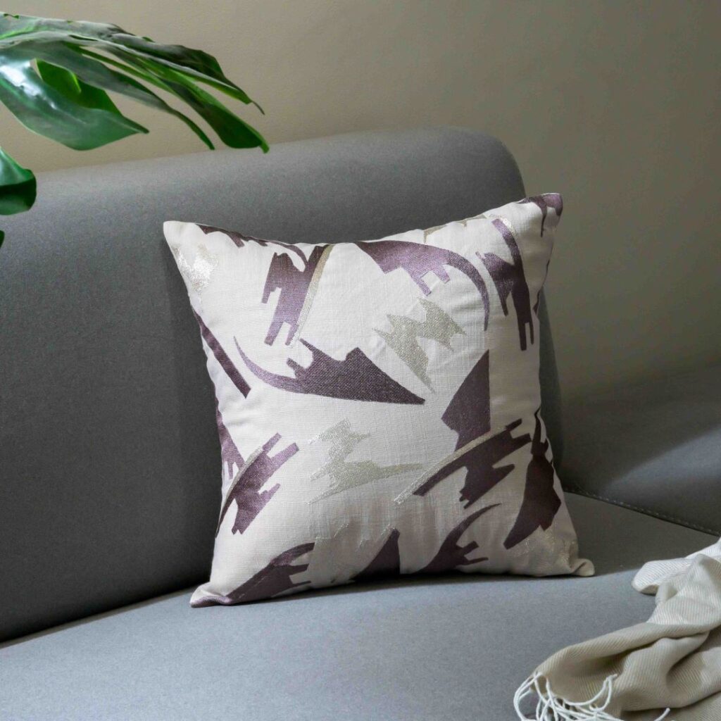 a beautiful cushion with best cushion cover on sofa in an living room